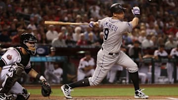PHOENIX, AZ - MARCH 29: DJ LeMahieu #9 of the Colorado Rockies bats against the Arizona Diamondbacks during the opening day MLB game at Chase Field on March 29, 2018 in Phoenix, Arizona. (Photo by Christian Petersen/Getty Images)