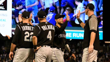 CHICAGO, IL - MAY 01: The Colorado Rockies celebrate their win against the Chicago Cubs on May 1, 2018 at Wrigley Field in Chicago, Illinois. The Rockies won 3-1. (Photo by David Banks/Getty Images)