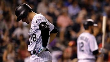 DENVER, CO - SEPTEMBER 02: Nolan Arenado #28 of the Colorado Rockies walks to the dugout after grounding out in the eighth inning against the Arizona Diamondbacks at Coors Field on September 2, 2017 in Denver, Colorado. Arizona won 6-2. (Photo by Joe Mahoney/Getty Images)