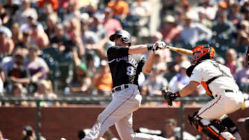 SAN FRANCISCO, CA - JUNE 28: DJ LeMahieu #9 of the Colorado Rockies hits a two-run home run in the ninth inning against the San Francisco Giants at AT&T Park on June 28, 2018 in San Francisco, California. (Photo by Ezra Shaw/Getty Images)