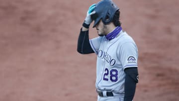 OAKLAND, CALIFORNIA - JULY 28: Nolan Arenado #28 of the Colorado Rockies waits in the on-deck circle in the top of the first inning against the Oakland Athletics at Oakland-Alameda County Coliseum on July 28, 2020 in Oakland, California. (Photo by Lachlan Cunningham/Getty Images)