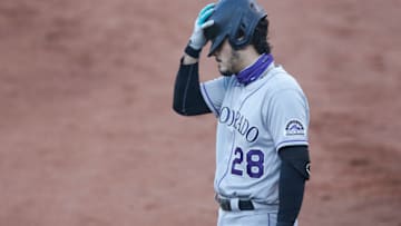 OAKLAND, CALIFORNIA - JULY 28: Nolan Arenado #28 of the Colorado Rockies waits in the on-deck circle in the top of the first inning against the Oakland Athletics at Oakland-Alameda County Coliseum on July 28, 2020 in Oakland, California. (Photo by Lachlan Cunningham/Getty Images)