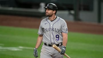SEATTLE, WA - AUGUST 08: Daniel Murphy #9 of the Colorado Rockies walks off the field after an at-bat during a game at T-Mobile Park on August, 8, 2020 in Seattle, Washington. The Rockies won 5-0. (Photo by Stephen Brashear/Getty Images)
