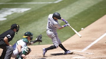 OAKLAND, CA - JULY 29: Garrett Hampson #1 of the Colorado Rockies bats during the game against the Oakland Athletics at RingCentral Coliseum on July 29, 2020 in Oakland, California. The Rockies defeated the Athletics 5-1. (Photo by Michael Zagaris/Oakland Athletics/Getty Images)
