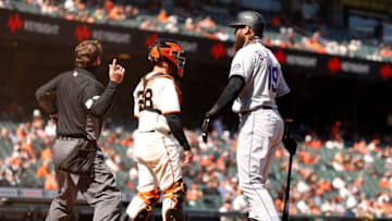 SAN FRANCISCO, CALIFORNIA - APRIL 09: Charlie Blackmon #19 of the Colorado Rockies argues with home plate umpire Ben May #97 after he struck out in the seventh inning against the San Francisco Giants during the Giants home opener at Oracle Park on April 09, 2021 in San Francisco, California. May ejected Blackmon from the game. (Photo by Ezra Shaw/Getty Images)