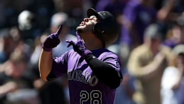 DENVER, CO - SEPTEMBER 13: Nolan Arenado #28 of the Colorado Rockies celebrates as he crosses the plate after hitting a home run in the first inning against the Arizona Diamondbacks at Coors Field on September 13, 2018 in Denver, Colorado. (Photo by Matthew Stockman/Getty Images)