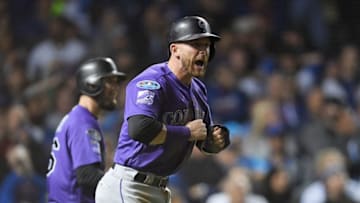 CHICAGO, IL - OCTOBER 02: Trevor Story #27 of the Colorado Rockies celebrates after scoring a run in the thirteenth inning to give the Rockies a 2-1 lead against the Chicago Cubs during the National League Wild Card Game at Wrigley Field on October 2, 2018 in Chicago, Illinois. (Photo by Stacy Revere/Getty Images)