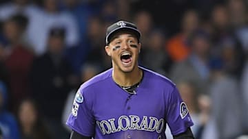 CHICAGO, IL - OCTOBER 02: Nolan Arenado #28 of the Colorado Rockies celebrates defeating the Chicago Cubs 2-1 in thirteen innings to win the National League Wild Card Game at Wrigley Field on October 2, 2018 in Chicago, Illinois. (Photo by Stacy Revere/Getty Images)