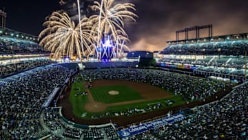 DENVER, CO - SEPTEMBER 20: Fireworks are set over the field as spectators fill the outfield after a game between the Colorado Rockies and the Arizona Diamondbacks at Coors Field on September 20, 2013 in Denver, Colorado. The Rockies beat the Diamondbacks 9-4. (Photo by Dustin Bradford/Getty Images)