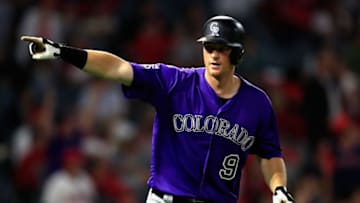 ANAHEIM, CA - AUGUST 27: DJ LeMahieu #9 of the Colorado Rockies reacts to hitting a grand slam during the eighth inning of a game against the Los Angeles Angels of Anaheim at Angel Stadium on August 27, 2018 in Anaheim, California. (Photo by Sean M. Haffey/Getty Images)