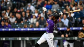 DENVER, CO - APRIL 23: Raimel Tapia #15 of the Colorado Rockies follows through on a second-inning, two-run home run against the Washington Nationals at Coors Field on April 23, 2019 in Denver, Colorado. (Photo by Dustin Bradford/Getty Images)