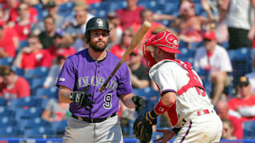 PHILADELPHIA, PA - MAY 19: Daniel Murphy #9 of the Colorado Rockies flips his bat in the air after striking out in the eighth inning during a game against the Philadelphia Phillies at Citizens Bank Park on May 19, 2019 in Philadelphia, Pennsylvania. The Phillies won 7-5. (Photo by Hunter Martin/Getty Images)