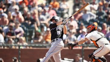 SAN FRANCISCO, CA - JUNE 28: DJ LeMahieu #9 of the Colorado Rockies hits a two-run home run in the ninth inning against the San Francisco Giants at AT&T Park on June 28, 2018 in San Francisco, California. (Photo by Ezra Shaw/Getty Images)