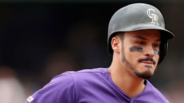 DENVER, COLORADO - AUGUST 04: Nolan Arenado #28 of the Colorado Rockies circles the bases after hitting a solo home run in the first inning against the San Francisco Giants at Coors Field on August 04, 2019 in Denver, Colorado. (Photo by Matthew Stockman/Getty Images)