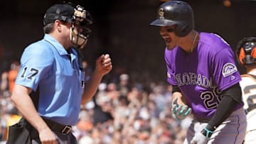 SAN FRANCISCO, CA - APRIL 13: Nolan Arenado #28 of the Colorado Rockies argues with home plate umpire D.J. Reyburn #17 after Arenado was called out on strikes against the San Francisco Giants in the top of the six inning of a Major League Baseball game at Oracle Park on April 13, 2019 in San Francisco, California. (Photo by Thearon W. Henderson/Getty Images)