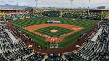 SCOTTSDALE, ARIZONA - FEBRUARY 23: An overhead view of the Oakland Athletics and Arizona Diamondbacks as they stand for the national anthem prior to the spring training game at Salt River Fields at Talking Stick on February 23, 2020 in Scottsdale, Arizona. (Photo by Jennifer Stewart/Getty Images)