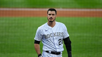 Sep 12, 2020; Denver, Colorado, USA; Colorado Rockies third baseman Nolan Arenado (28) reacts following his strikeout in the first inning against the Los Angeles Angels at Coors Field. Mandatory Credit: Ron Chenoy-USA TODAY Sports