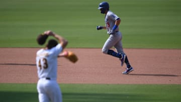 Sep 16, 2020; San Diego, California, USA; Los Angeles Dodgers left fielder Chris Taylor (3) rounds the bases after hitting a home run during the sixth inning as San Diego Padres relief pitcher Garrett Richards (43) reacts at Petco Park. Mandatory Credit: Orlando Ramirez-USA TODAY Sports