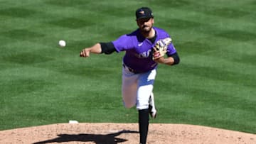 Mar 10, 2021; Salt River Pima-Maricopa, Arizona, USA; Colorado Rockies relief pitcher Justin Lawrence (74) throws in the fourth inning against the San Diego Padres during a spring training game at Salt River Fields at Talking Stick. Mandatory Credit: Matt Kartozian-USA TODAY Sports