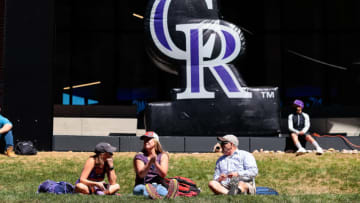 Apr 1, 2021; Denver, Colorado, USA; Fans relax in the grass at McGregor Square before the Opening Day game between the Colorado Rockies and the Los Angeles Dodgers at Coors Field. Mandatory Credit: Isaiah J. Downing-USA TODAY Sports
