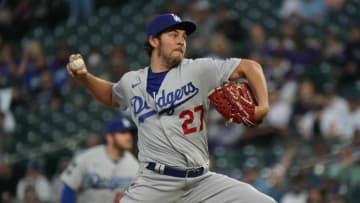 Apr 2, 2021; Denver, Colorado, USA; Los Angeles Dodgers starting pitcher Trevor Bauer (27) delivers a pitch in the second inning against the Colorado Rockies at Coors Field. Mandatory Credit: Ron Chenoy-USA TODAY Sports