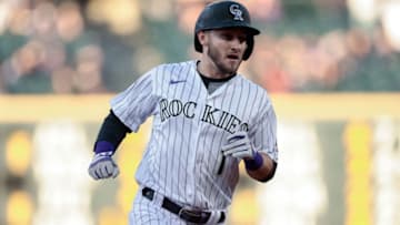 Apr 7, 2021; Denver, Colorado, USA; Colorado Rockies center fielder Garrett Hampson (1) runs to third after stealing second base in the first inning against the Arizona Diamondbacks at Coors Field. Mandatory Credit: Isaiah J. Downing-USA TODAY Sports