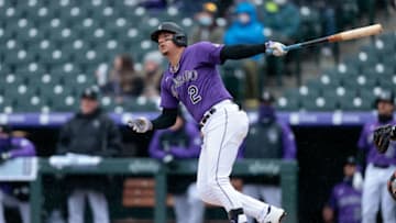 Apr 21, 2021; Denver, Colorado, USA; Colorado Rockies center fielder Yonathan Daza (2) watches his ball on a solo home run in the second inning against the Houston Astros at Coors Field. Mandatory Credit: Isaiah J. Downing-USA TODAY Sports