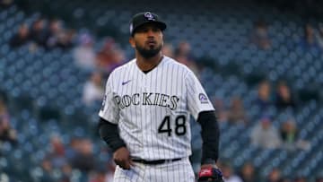 Apr 23, 2021; Denver, Colorado, USA; Colorado Rockies starting pitcher German Marquez (48) walks off the mound in the first inning against the Philadelphia Phillies at Coors Field. Mandatory Credit: Ron Chenoy-USA TODAY Sports