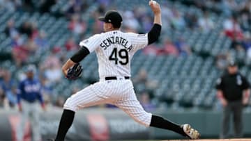 Jun 2, 2021; Denver, Colorado, USA; Colorado Rockies starting pitcher Antonio Senzatela (49) pitches in the first inning against the Texas Rangers at Coors Field. Mandatory Credit: Isaiah J. Downing-USA TODAY Sports