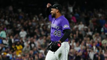 Jun 29, 2021; Denver, Colorado, USA; Colorado Rockies starting pitcher German Marquez (48) celebrates defeating the Pittsburgh Pirates at Coors Field. Mandatory Credit: Ron Chenoy-USA TODAY Sports