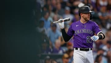 Jul 3, 2021; Denver, Colorado, USA; Colorado Rockies shortstop Trevor Story (27) stretches on deck in the third inning against the St. Louis Cardinals at Coors Field. Mandatory Credit: Isaiah J. Downing-USA TODAY Sports