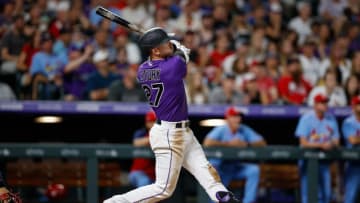 Jul 3, 2021; Denver, Colorado, USA; Colorado Rockies shortstop Trevor Story (27) watches his ball on a three run home run against the St. Louis Cardinals in the seventh inning at Coors Field. Mandatory Credit: Isaiah J. Downing-USA TODAY Sports