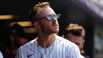 Aug 5, 2021; Denver, Colorado, USA; Colorado Rockies shortstop Trevor Story (27) reacts after hitting a two run home run against the Chicago Cubs in the fifth inning at Coors Field. Mandatory Credit: Ron Chenoy-USA TODAY Sports