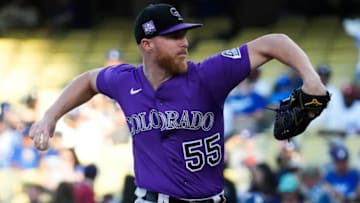 Aug 28, 2021; Los Angeles, California, USA; Colorado Rockies starting pitcher Jon Gray (55) throws a pitch in the first inning against the Los Angeles Dodgers at Dodger Stadium. Mandatory Credit: Robert Hanashiro-USA TODAY Sports