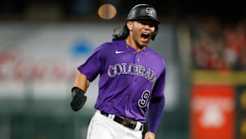 Sep 3, 2021; Denver, Colorado, USA; Colorado Rockies left fielder Connor Joe (9) reacts as he runs to third base against the Atlanta Braves in the third inning at Coors Field. Mandatory Credit: Isaiah J. Downing-USA TODAY Sports