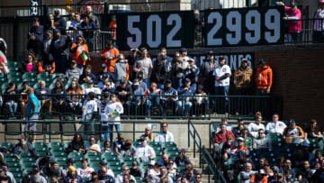 Detroit Tigers fans watch action vs. the New York Yankees during the eighth inning at Comerica Park on Thursday, April 21, 2022. The Miguel Cabrera milestone trackers for career home runs and hits sits on the concourse in left-center field.04212022 Tigers 23 Miggy Milestones
