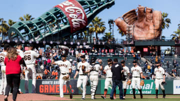 May 11, 2022; San Francisco, California, USA; San Francisco Giants players celebrate after defeating the Colorado Rockies at Oracle Park. Mandatory Credit: John Hefti-USA TODAY Sports