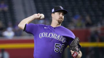 Jul 8, 2021; Phoenix, Arizona, USA; Colorado Rockies starting pitcher Chi Chi Gonzalez (50) throws a pitch against the Arizona Diamondbacks in the first inning at Chase Field. Mandatory Credit: Rick Scuteri-USA TODAY Sports