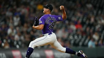 Aug 6, 2021; Denver, Colorado, USA; Colorado Rockies relief pitcher Robert Stephenson (29) delivers a pitch in the ninth inning against the against the Miami Marlins at Coors Field. Mandatory Credit: Ron Chenoy-USA TODAY Sports