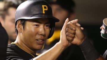 Sep 11, 2015; Pittsburgh, PA, USA; Pittsburgh Pirates third baseman Jung Ho Kang (27) celebrates in the dugout after scoring a run against the Milwaukee Brewers during the sevenh inning at PNC Park. Mandatory Credit: Charles LeClaire-USA TODAY Sports