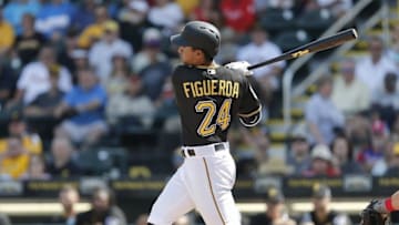 Mar 7, 2016; Bradenton, FL, USA; Pittsburgh Pirates second baseman Cole Figueroa (24) bats during the fifth inning of a spring training baseball game against the Philadelphia Phillies at McKechnie Field. Mandatory Credit: Reinhold Matay-USA TODAY Sports