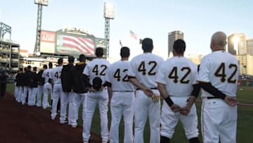 Apr 15, 2016; Pittsburgh, PA, USA; The Pittsburgh Pirates stand for the national anthem while honoring Jackie Robinson Day across Major League Baseball before playing the Milwaukee Brewers at PNC Park. Mandatory Credit: Charles LeClaire-USA TODAY Sports