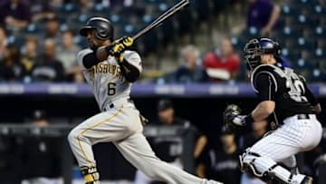 Sep 23, 2015; Denver, CO, USA; Pittsburgh Pirates left fielder Starling Marte (6) singles in the first inning against the Colorado Rockies at Coors Field. Mandatory Credit: Ron Chenoy-USA TODAY Sports