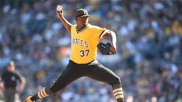 Apr 17, 2016; Pittsburgh, PA, USA; Pittsburgh Pirates relief pitcher Arquimedes Caminero (37) pitches against the Milwaukee Brewers during the seventh inning at PNC Park. The Pirates won 9-3. Mandatory Credit: Charles LeClaire-USA TODAY Sports