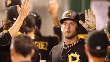 May 24, 2016; Pittsburgh, PA, USA; Pittsburgh Pirates pinch hitter David Freese (23) high-fives in the dugout after scoring a run against the Arizona Diamondbacks during the sixth inning at PNC Park. Mandatory Credit: Charles LeClaire-USA TODAY Sports
