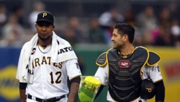 Apr 29, 2016; Pittsburgh, PA, USA; Pittsburgh Pirates starting pitcher Juan Nicasio (12) and catcher Francisco Cervelli (29) make their way in from the bullpen before playing the Cincinnati Reds at PNC Park. Mandatory Credit: Charles LeClaire-USA TODAY Sports