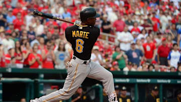 May 7, 2016; St. Louis, MO, USA; Pittsburgh Pirates left fielder Starling Marte (6) hits a one run double off of St. Louis Cardinals relief pitcher Trevor Rosenthal (not pictured) during the ninth inning at Busch Stadium. The Cardinals won 6-4. Mandatory Credit: Jeff Curry-USA TODAY Sports