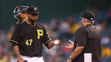 Jun 3, 2016; Pittsburgh, PA, USA; Pittsburgh Pirates starting pitcher Francisco Liriano (47) hands the ball to manager Clint Hurdle (right) after being removed from the game against the Los Angeles Angels during the fourth inning at PNC Park. Mandatory Credit: Charles LeClaire-USA TODAY Sports