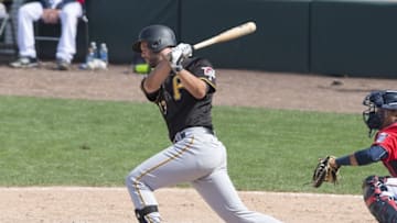 Mar 21, 2016; Fort Myers, FL, USA; Pittsburgh Pirates catcher Jacob Stallings (83) hits a single and drives in a run during the ninth inning against the Minnesota Twins at CenturyLink Sports Complex. The Pirates shut out the Twins 2-0. Mandatory Credit: Jerome Miron-USA TODAY Sports
