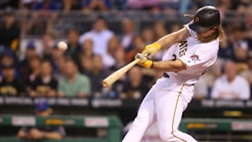 Jun 7, 2016; Pittsburgh, PA, USA; Pittsburgh Pirates first baseman John Jaso (28) hits an RBI double against the New York Mets during the fifth inning in game two of a double header at PNC Park. Mandatory Credit: Charles LeClaire-USA TODAY Sports